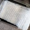 Wired2Fire Mini PC with bubble wrap inside